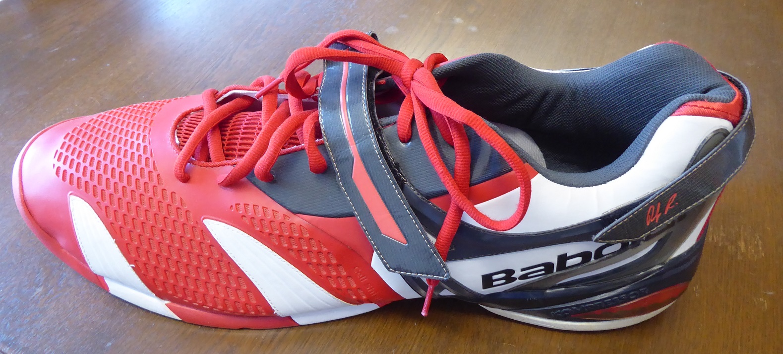 An Oversize Babolat Andy Roddick Tennis Shoe