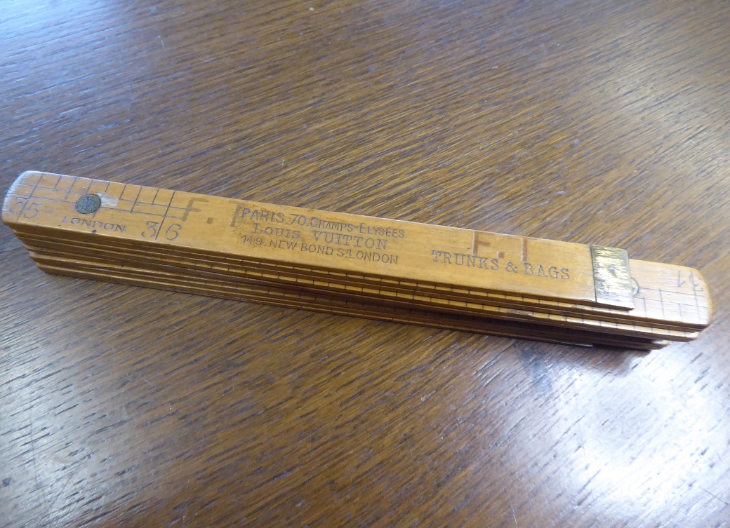 A Louis Vuitton Folding Measuring Rule