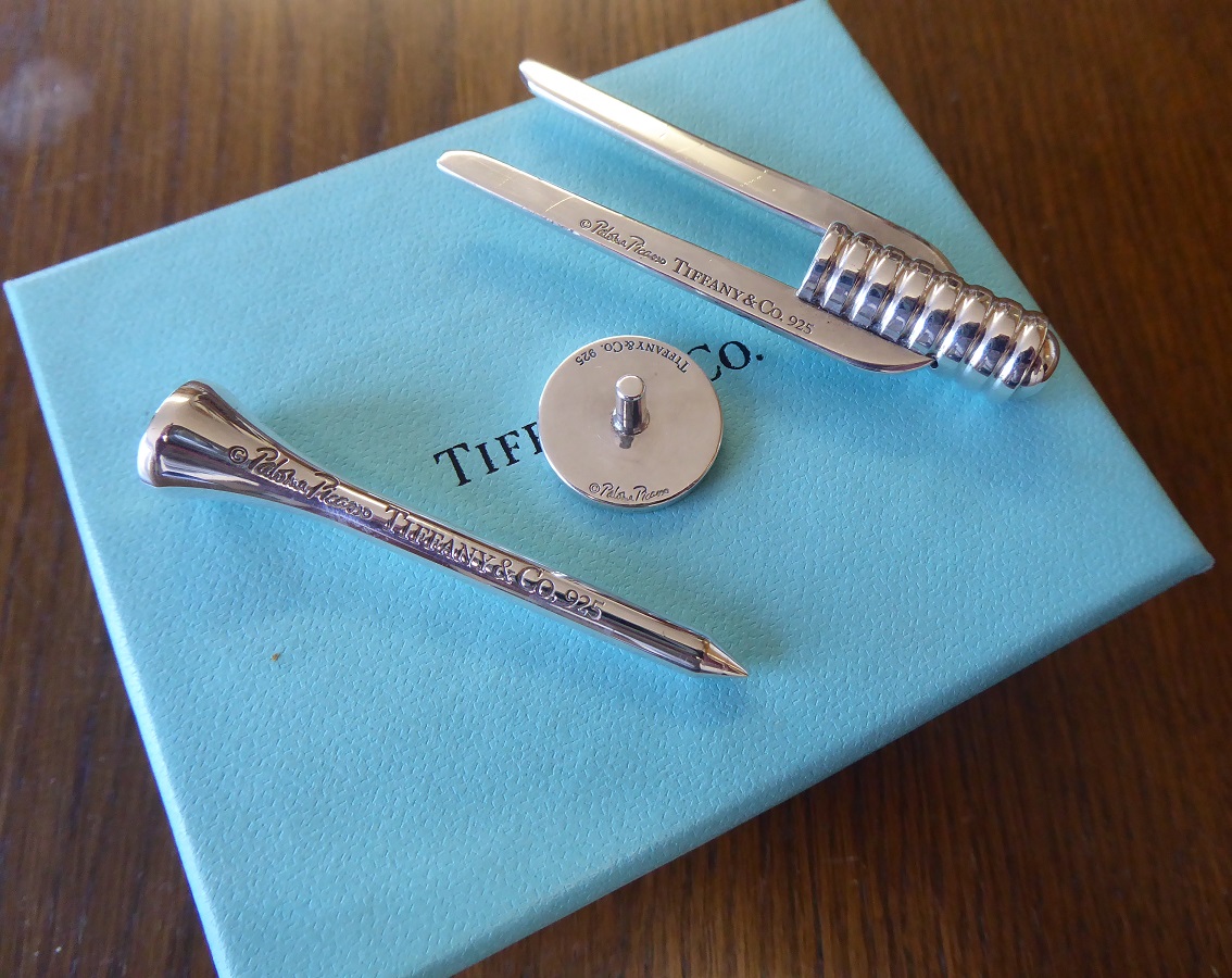 A Tiffany & Co Sterling Silver Golf Tee, Marker & Divot Tool Set