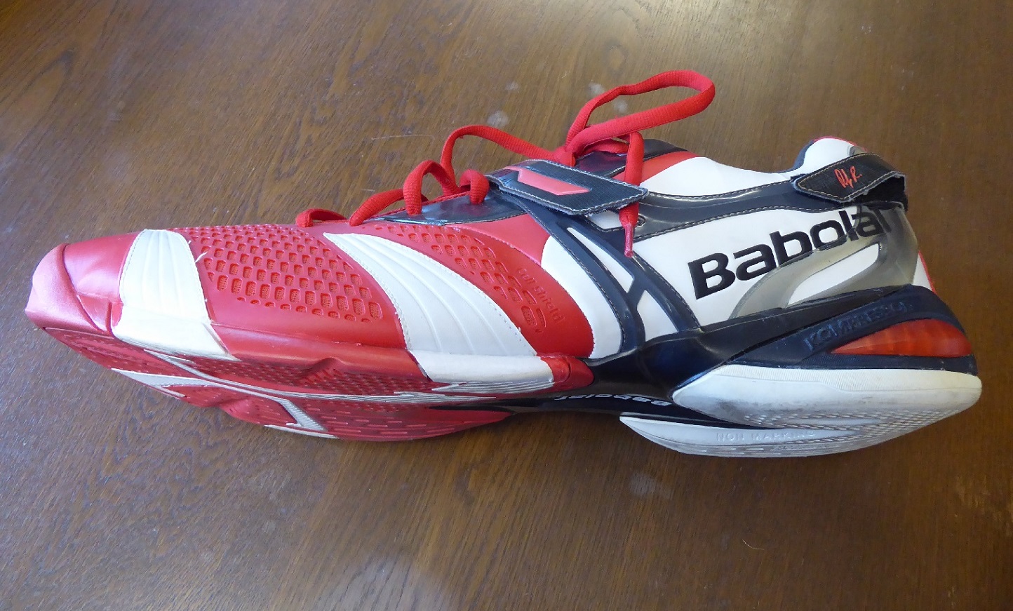 An Oversize Babolat Andy Roddick Tennis Shoe