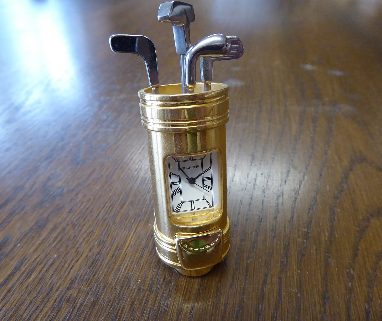 A Bucherer Novelty Golf Desk Clock