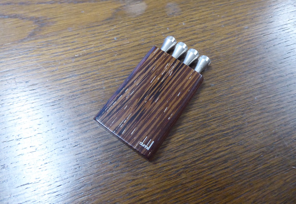 An Alfred Dunhill Sterling Silver Golf Tee Set