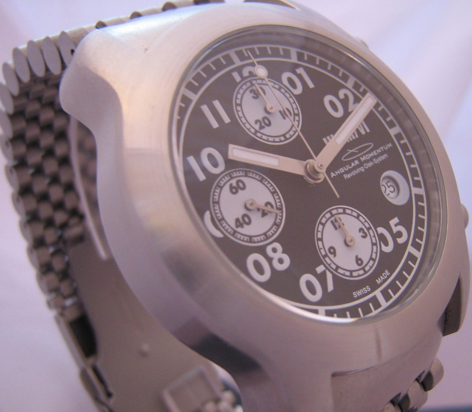 Angular Momentum Illum VI Chronograph, Black Dial With Steel Bracelet