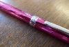 A Theo Fennell Pink Enamel & Silver Pen