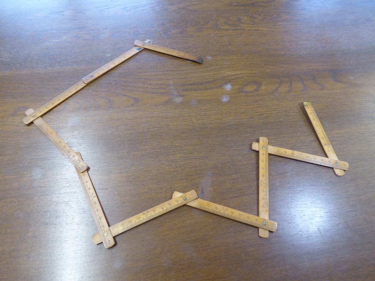 A Louis Vuitton Folding Measuring Rule