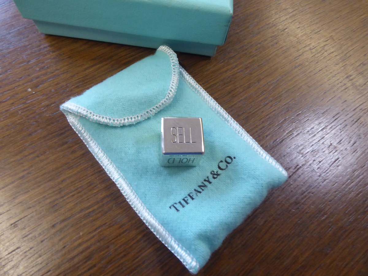 A Tiffany & Co Silver Buy, Sell, Hold Decision Dice