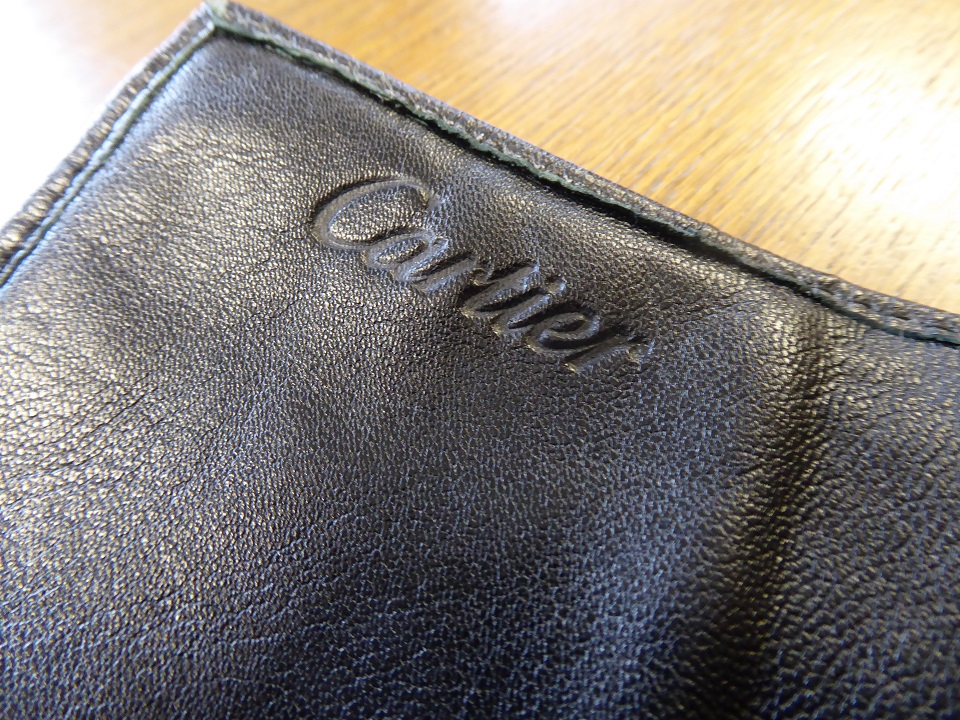 A Cartier Leather Watch Roll