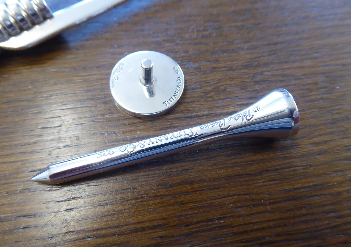 A Tiffany & Co Sterling Silver Golf Tee, Marker & Divot Tool Set