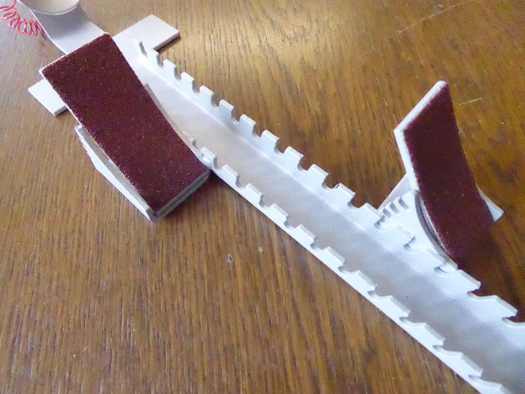 A Set Of Miniature Omega Running Blocks