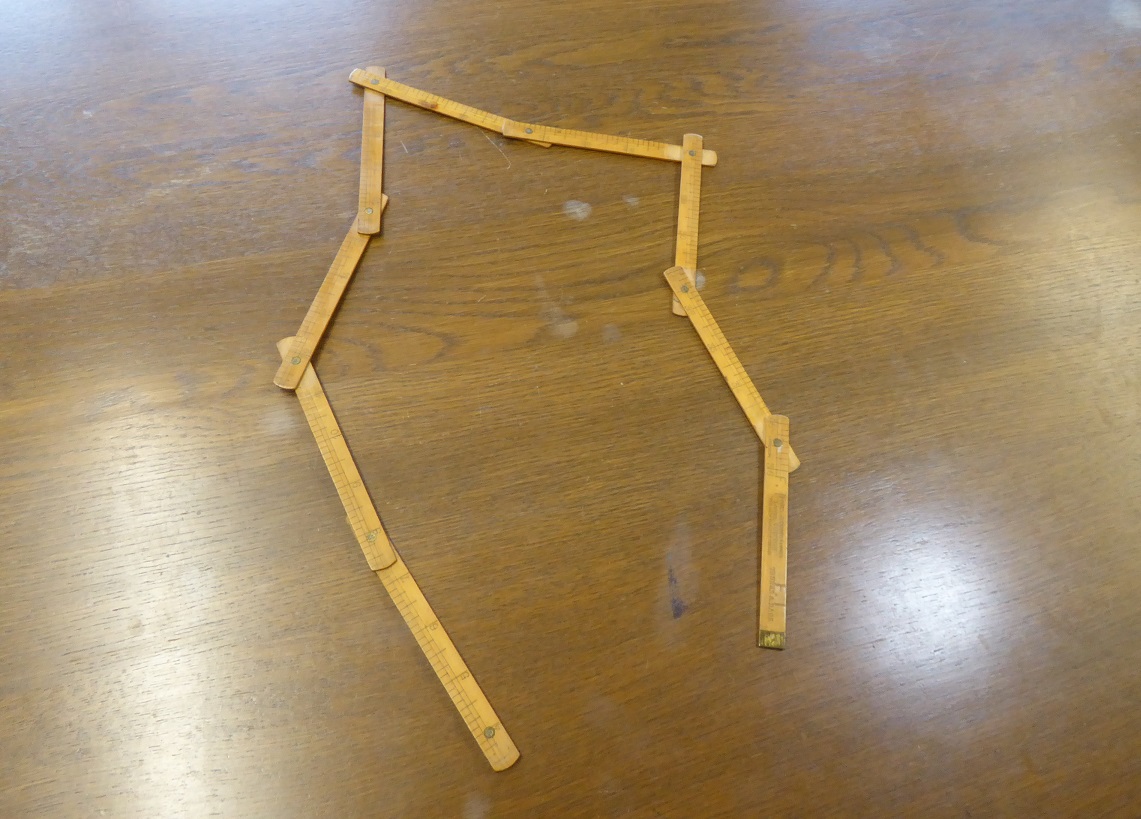 A Louis Vuitton Folding Measuring Rule