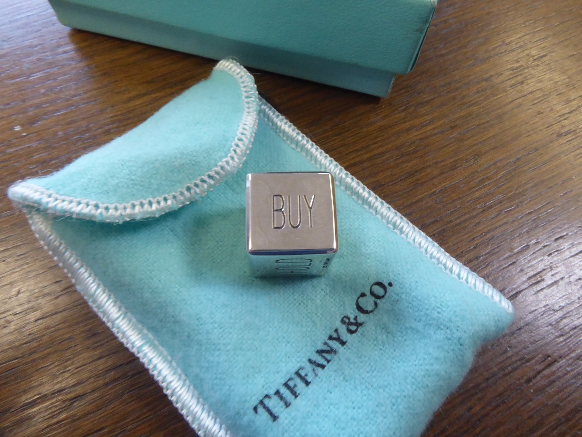 A Tiffany & Co Silver Buy, Sell, Hold Decision Dice