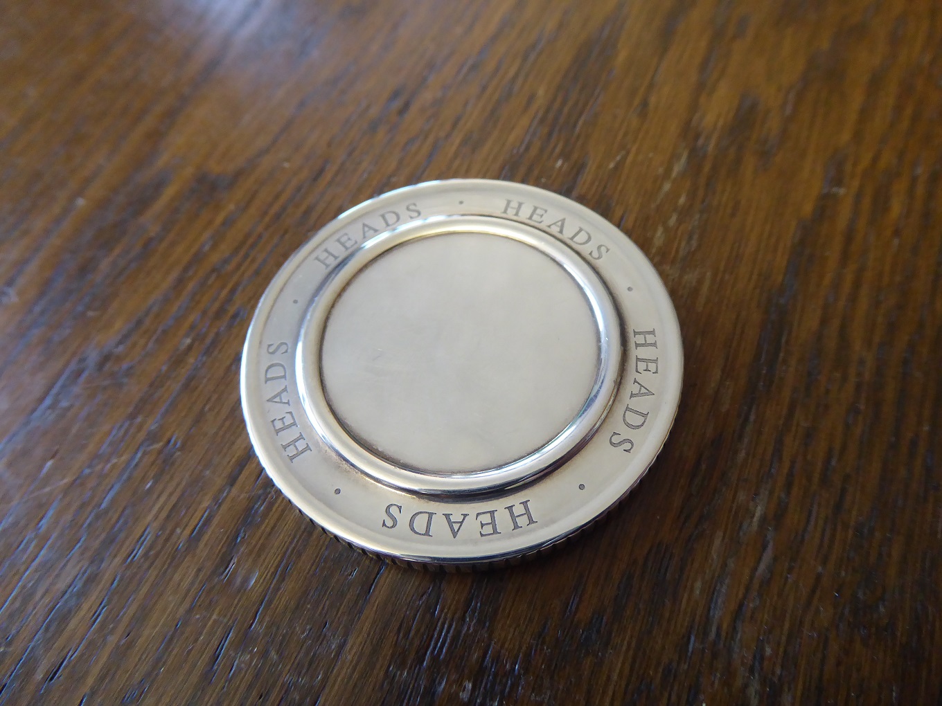 A Tiffany & Co Sterling Silver Heads Or Tails Coin