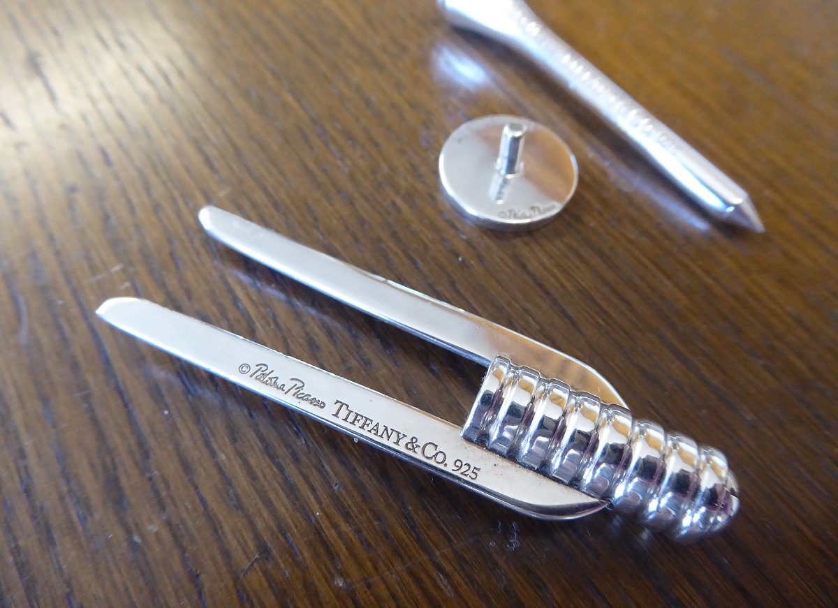 A Tiffany & Co Sterling Silver Golf Tee, Marker & Divot Tool Set