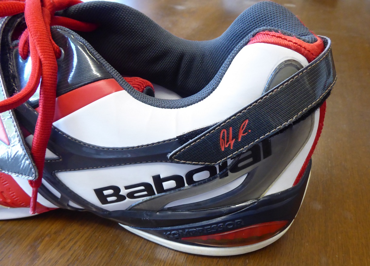 An Oversize Babolat Andy Roddick Tennis Shoe