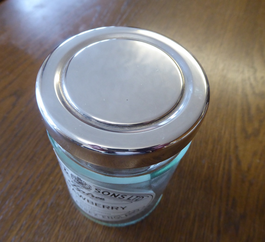 A Theo Fennell Sterling Silver Jar Lid Cover