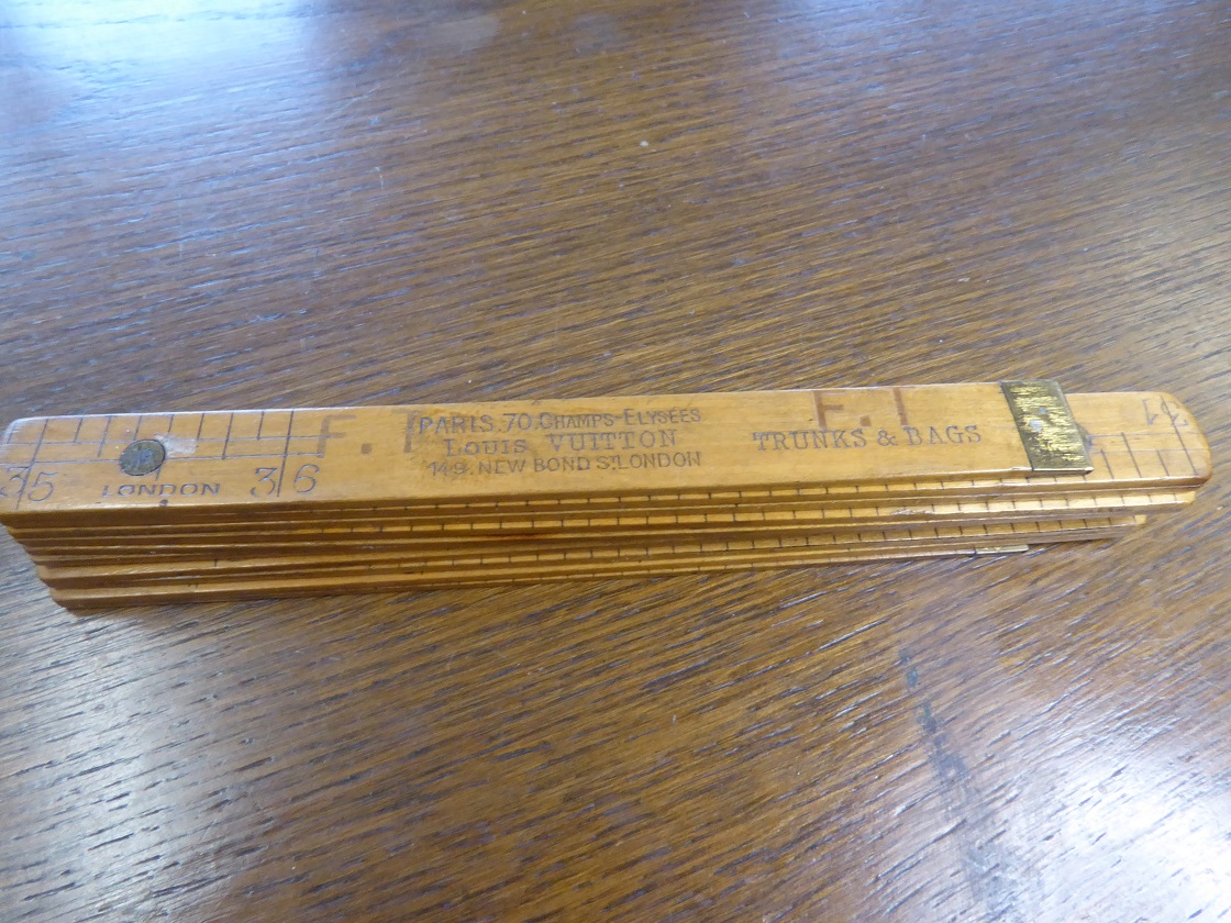 A Louis Vuitton Folding Measuring Rule