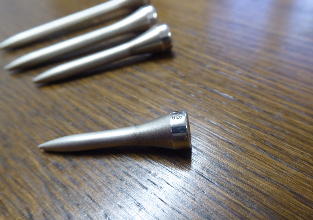 An Alfred Dunhill Sterling Silver Golf Tee Set