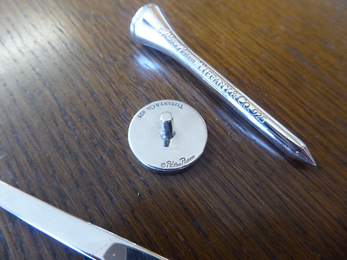 A Tiffany & Co Sterling Silver Golf Tee, Marker & Divot Tool Set